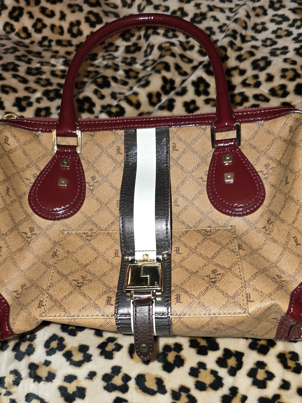 This is a L.A.M.B. by Gwen Stefani monogram Boston bag